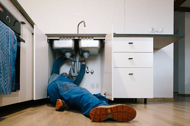 Professional Plumbing technician working in Wellsville, OH